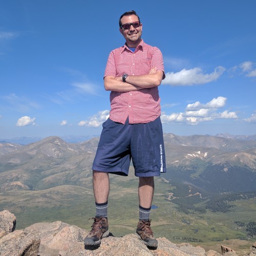 Devin Boyer at the summit of Mt. Beirstadt, CO